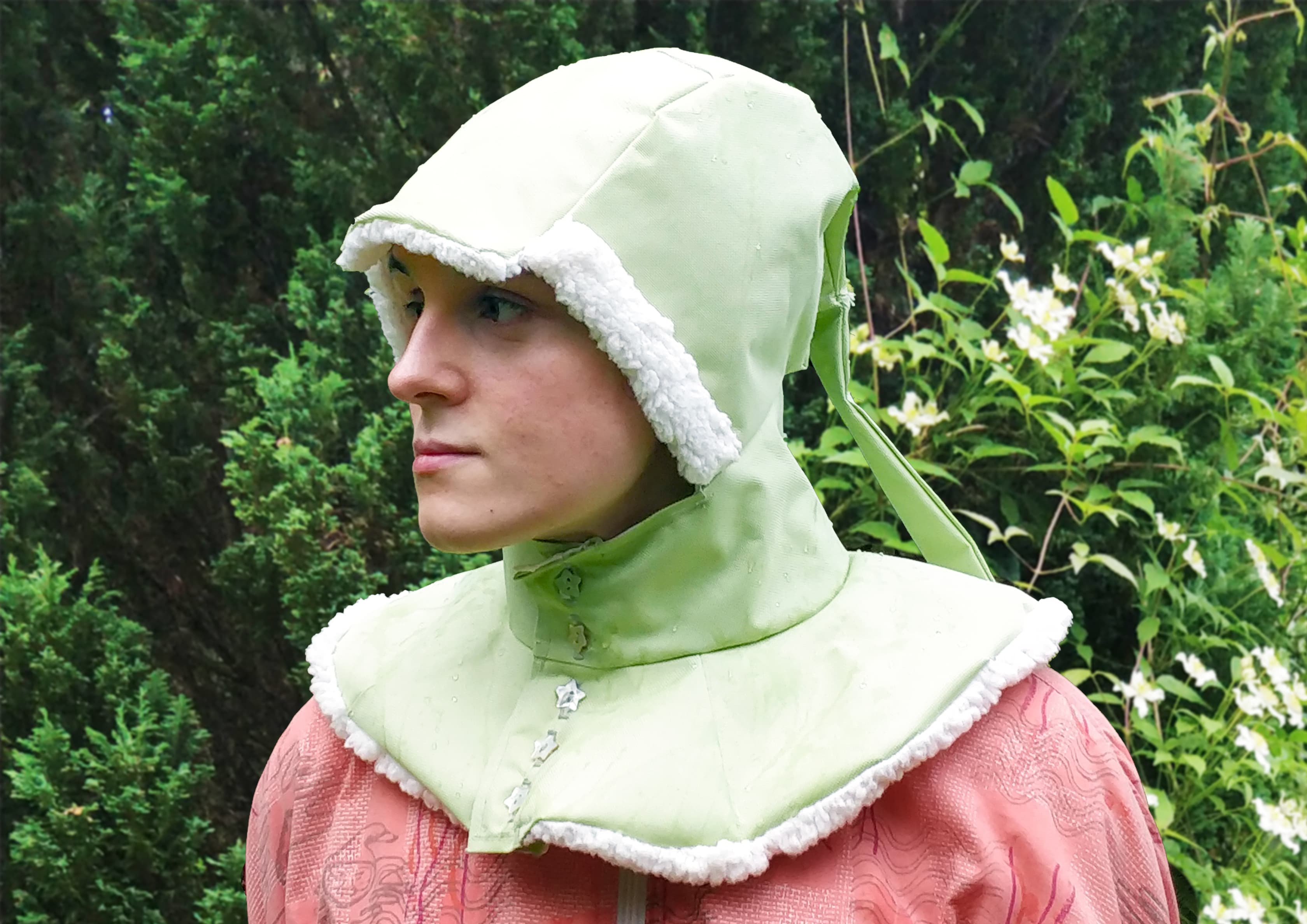 A green liripipe rain hood, made from cordura