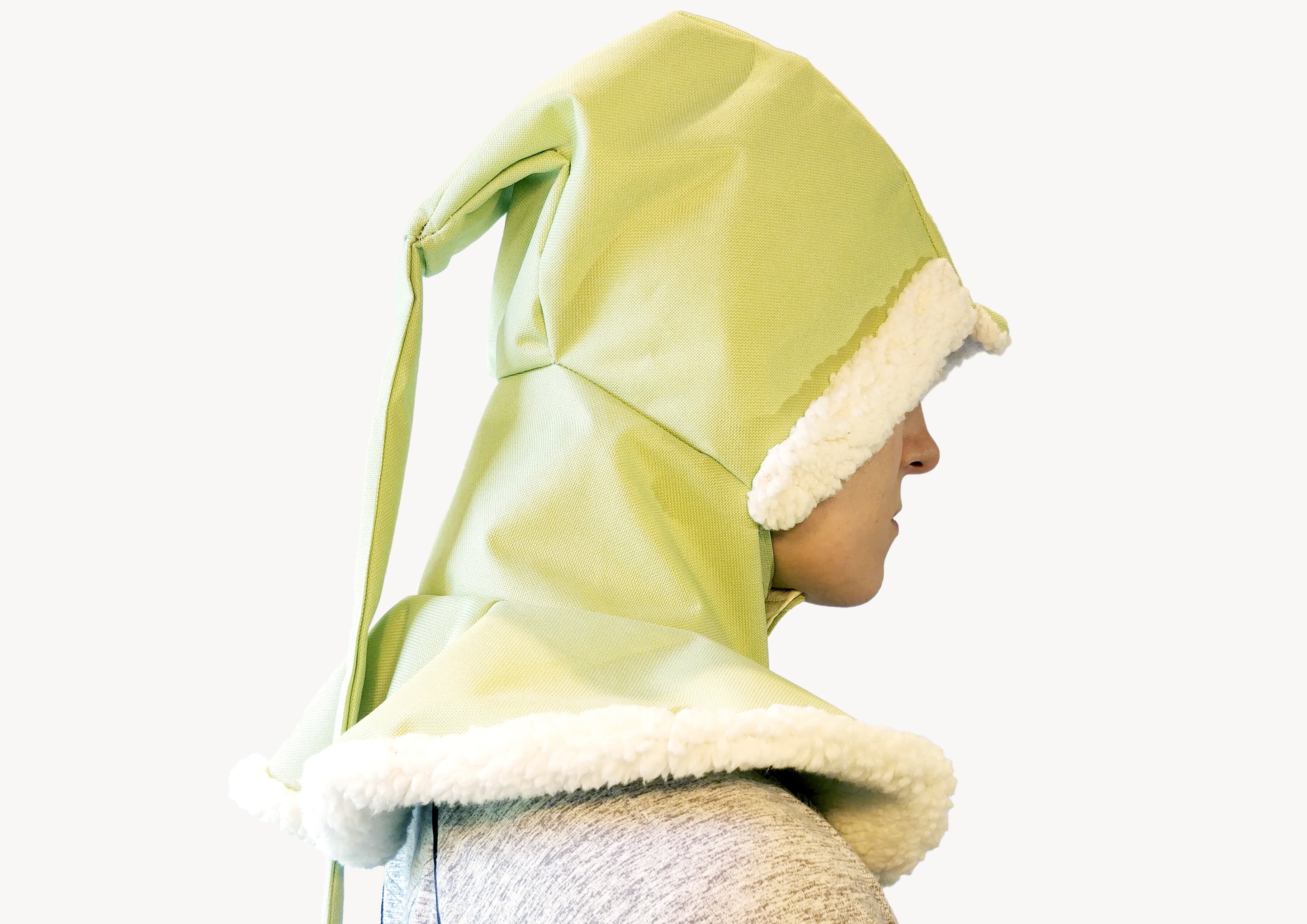 A green liripipe rain hood, showing the side